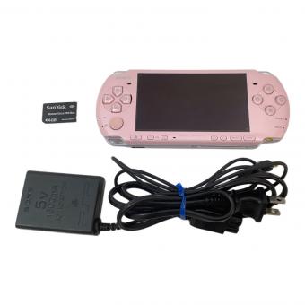 SONY PSP ブロッサムピンク、バッテリー欠品（ACアダプターで起動）、液晶縁にかけて黄ばみ、キズ有、スティック変色有、UMD読込OK、メモリースティック読込OK、各ボタンOK