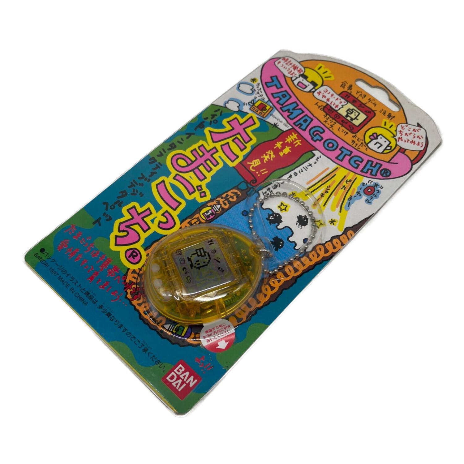 【未使用品】1997年製　第二弾発売　新種発見たまごっち＆「たまごっちと遊ぶ本」 BANDAI (バンダイ) たまごっち 新種発見!! たまごっち 1997