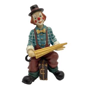 ピエロの置物 黄色い傘