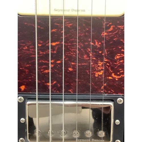 お楽しみキャスター 赤いエレキギター シングルコイル、トレモロ搭載