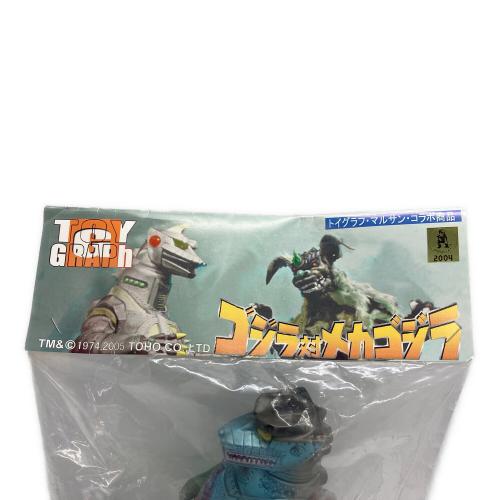 トイグラフ・マルサン・コラボ商品 メガゴジラ50％ ゴジラ対メカゴジラ 皮剥げ変身イメージ ソフビフィギュア