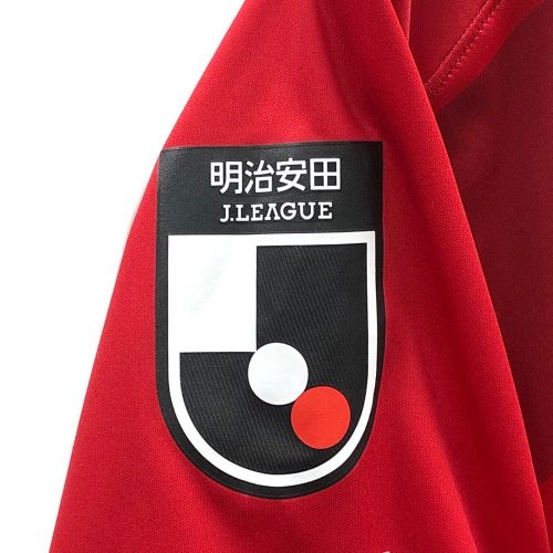 UNDER ARMOUR (アンダー アーマー) サッカーユニフォーム メンズ SIZE XL レッド 2024 UAイワキレプリカ ユニフォーム 10番  有馬 幸太郎