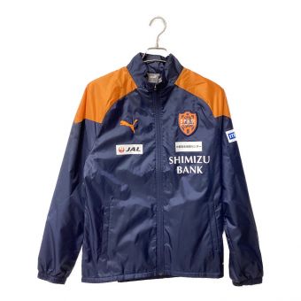 清水エスパルス (シミズエスパルス) サッカーウェア メンズ SIZE M オレンジ 23 PUMA 公式戦用ウーブンフルジップジャケット 77539582