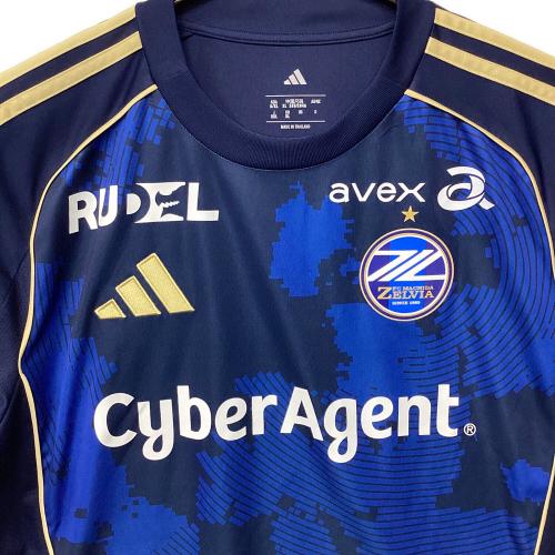 町田ゼルビア (マチダゼルビア) サッカーユニフォーム JD7389 百年構想リーグ 1stユニフォーム メンズ SIZE 2XL ブルー×ネイビー